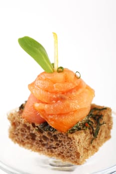 Delicious Finger food with bread and salmon