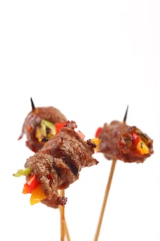 Appetizer Finger food with meat on sticks
