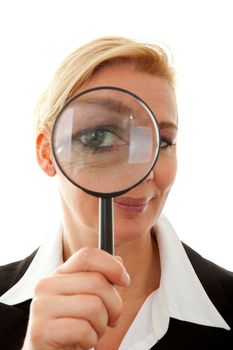 business woman with magnifying glass fto the eye over white background