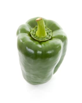 one fresh green paprika over white background