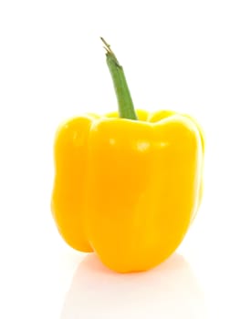 one fresh yellow paprika over white background
