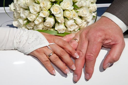 Hands of bride and groom in closeup
