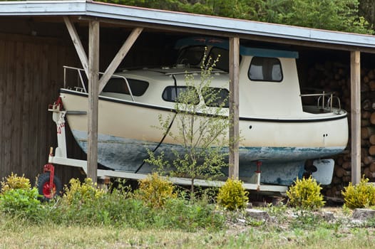 Cabin cruiser in the winter storage in Denmark