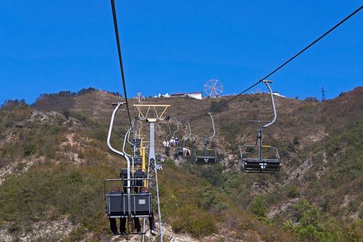 View of  ropeway on  mountain on sky background, Russia.