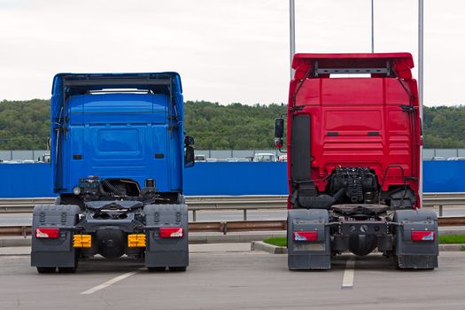 Two new truck in  parking lot for sale on sky background.