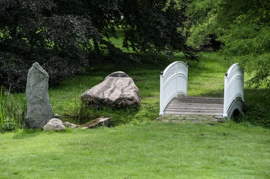 Bridge in a park crossing a creek