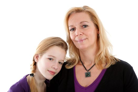 mother and daughter posing over white background