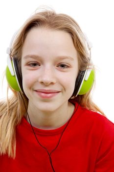 girl is listening to music with headphones on over white background