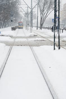 Approaching tram during heavy snow in Warsaw, Poland.