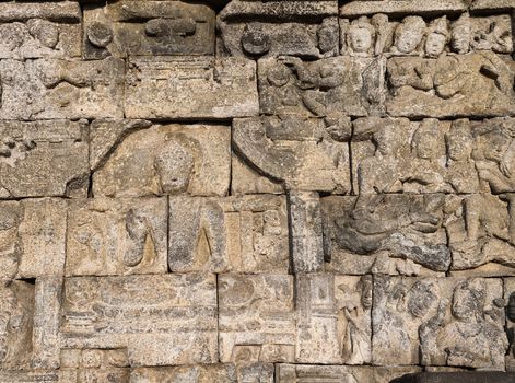 Detail of Buddhist carved relief at Borobudur temple on Java, Indonesia