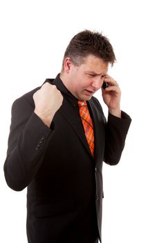 Angry businessman is calling on the phone over white background