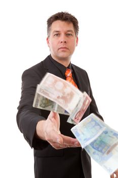 Businessman throws euro money over white background 
