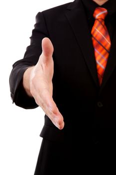 businessman is shaking your hand in closeup, isolated on white background