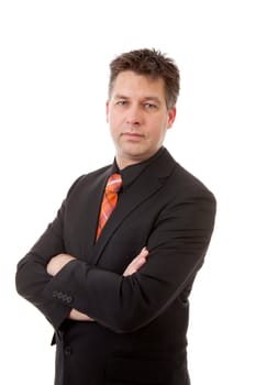 businessman is looking at camera with arms crossed over white background