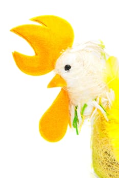 chicken head decoration in closeup over white background