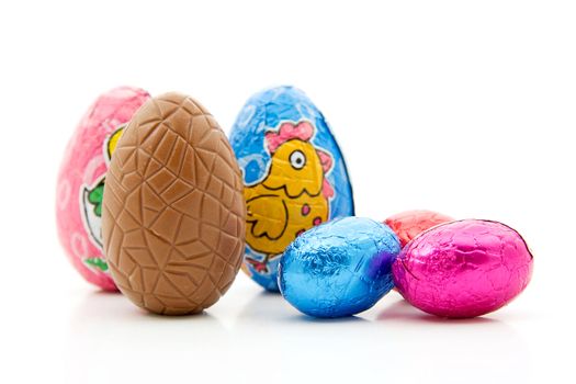 Colorful chocolate easter eggs, isolated on white background