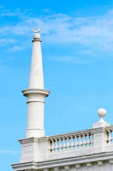 White column with muslim Crescent on the top with blue sky on background, Galle, Sri Lanka