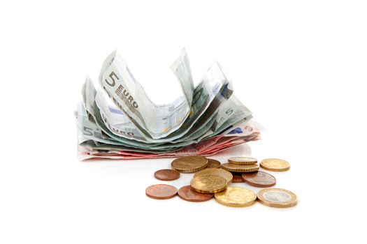 euro notes and coins over white background