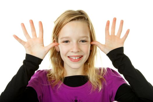 girl makes funny face over white background