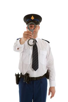 Police officer is showing handcuffs over white background