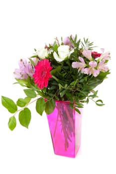Bouquet of purple and pink flowers over white background