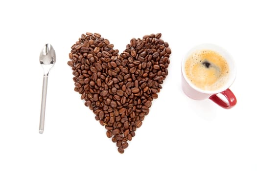 text I love coffee  in beans and cup over white background