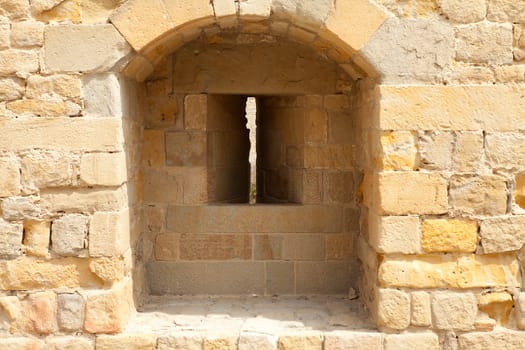 closeup of window in old brick wall