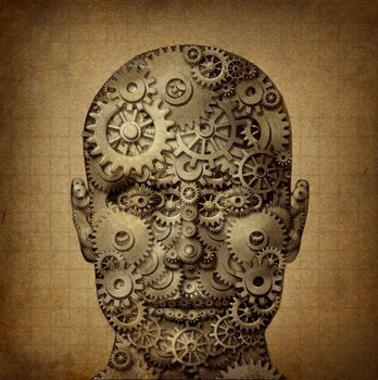 Power of human creativity with a front facing head made of gears and cogs on a grunge old parchment texture as a symbol of ingenuity and business or health success.