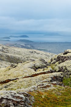 Icelandic landscape with mountains and the road. Nature reserve on the background, Iceland. Vertical view