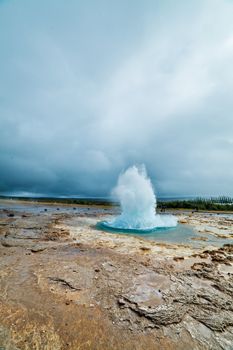 The phase of the eruption of the geyser - Iceland. Vertical view