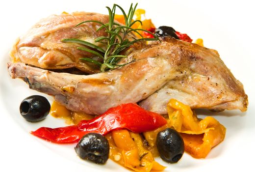 Baked rabbit with olives and pepper