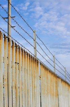 barbed wire and a sharp fence