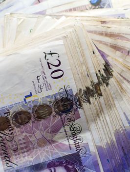a large bundle of british twenty pound notes 