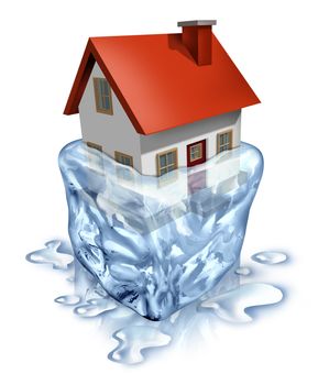 Real estate recovery symbol with a house in melting  ice as a housing concept of improving home buyers and sellers economy with debt relief and a better economy and low mortgage interest rates.