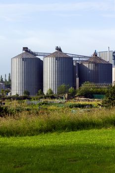 three large cylinder shaped buildings 