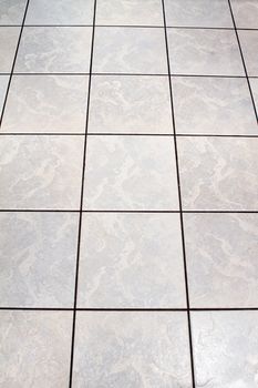 whitye floor tiles in a kitchen