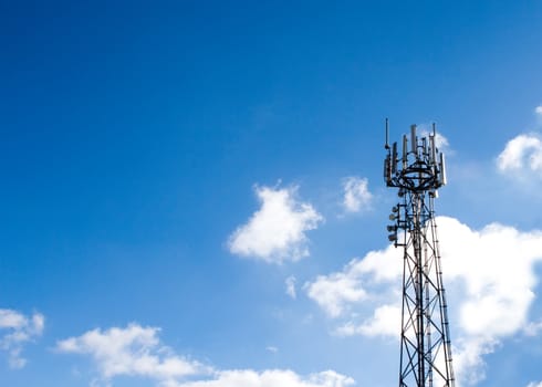 Mobile phone mast with a blue sky behind