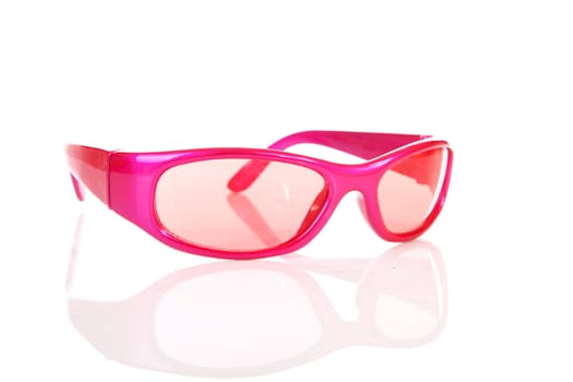 Pink sunglasses in closeup isolated on white background