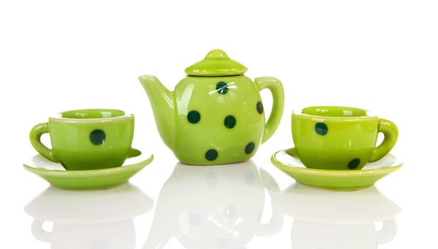green dotted tablewear over white background