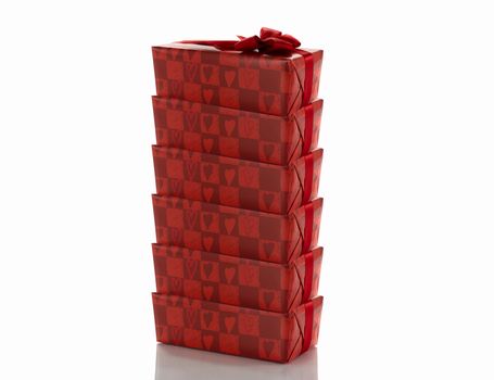stack of red presents isolated on white
