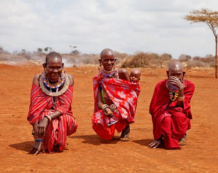 MASAI MARA, KENYA - JULY-2: unidentified African women from Masai tribe by traditional welcome dance on July 2, 2011 in a local village near Masai Mara National park, Kenya.