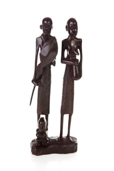 African carving, ebony masai family over white background