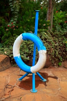 old blue and white life buoy