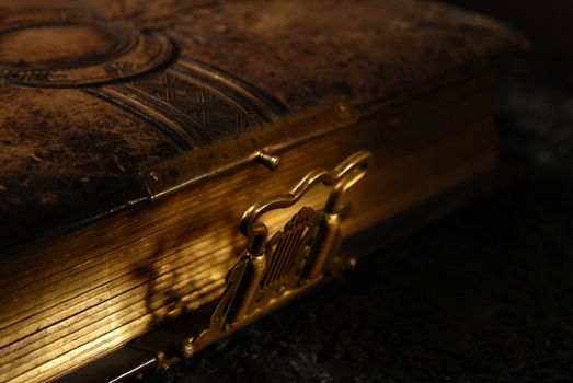 old leather album on a dark background