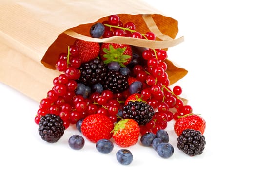 Bag with healthy fresh fruits over white background