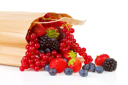 Bag with healthy fresh fruits over white background