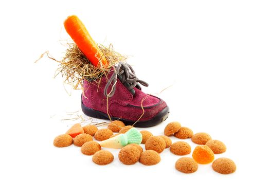 shoe and pepernoten, part of typical Dutch Sinterklaas tradition, isolated on white background