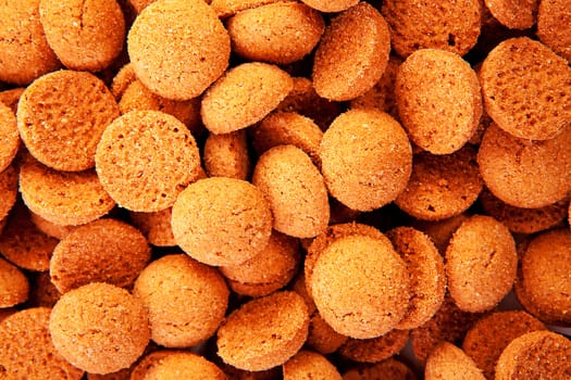 background of typical dutch sweets: pepernoten (ginger nuts) for a celebration at 5 december in the Netherlands 
