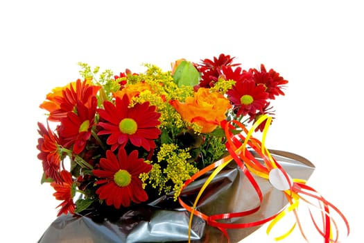 bouquet of flowers in gift paper over white background