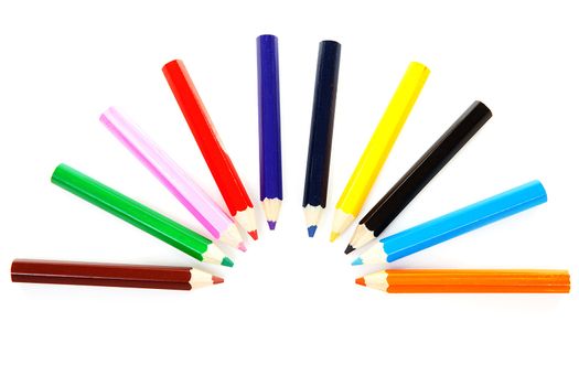 Colorful pencils in an circle over white background